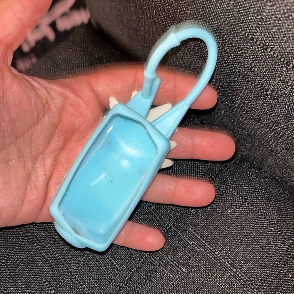 Pineapple hand sanitizer holder not sure of the brand  more square shape. - Picture 2 of 3